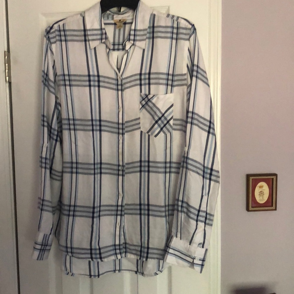Blue plaid shirt.